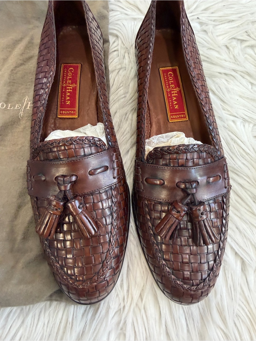 Cole Haan women’s Brown Woven Leather Tassel Loafers